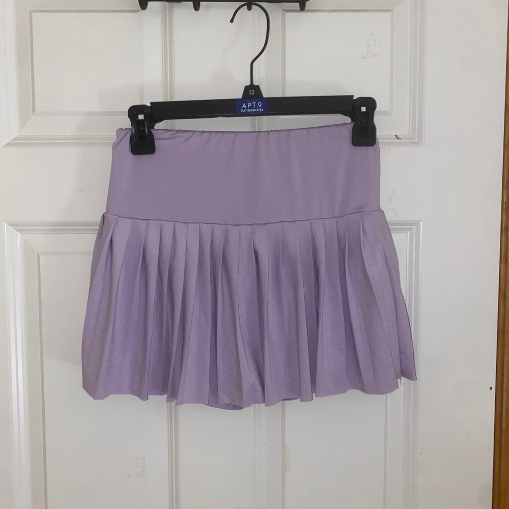Purple pleated mini skirt skort shorts underneath gold hinge athletic skirt